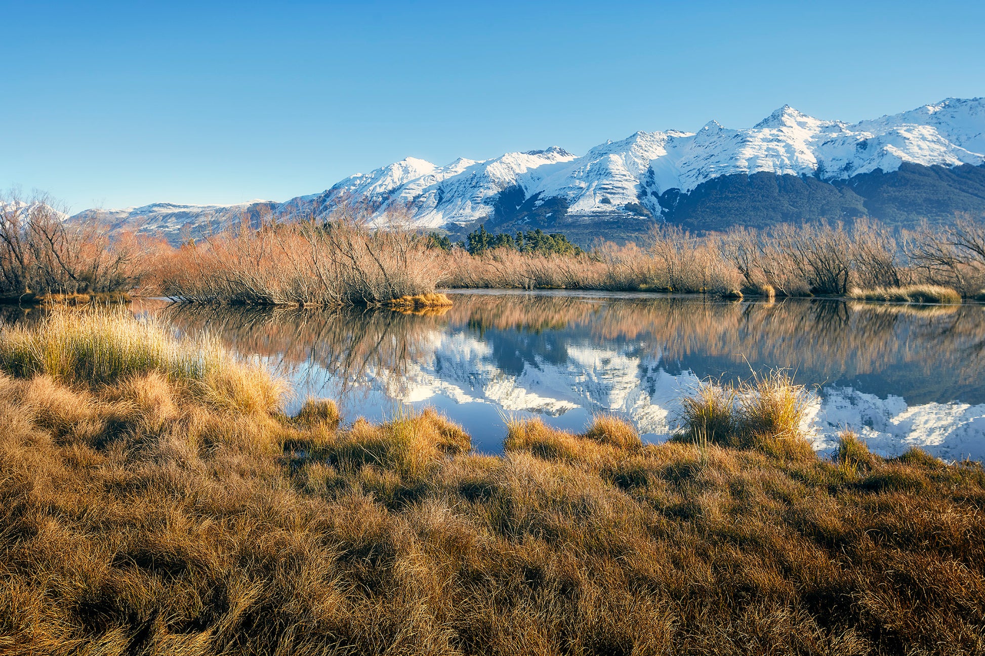 Scenic Lake Wakatipu and Southern Alps view on the road to Glenorchy