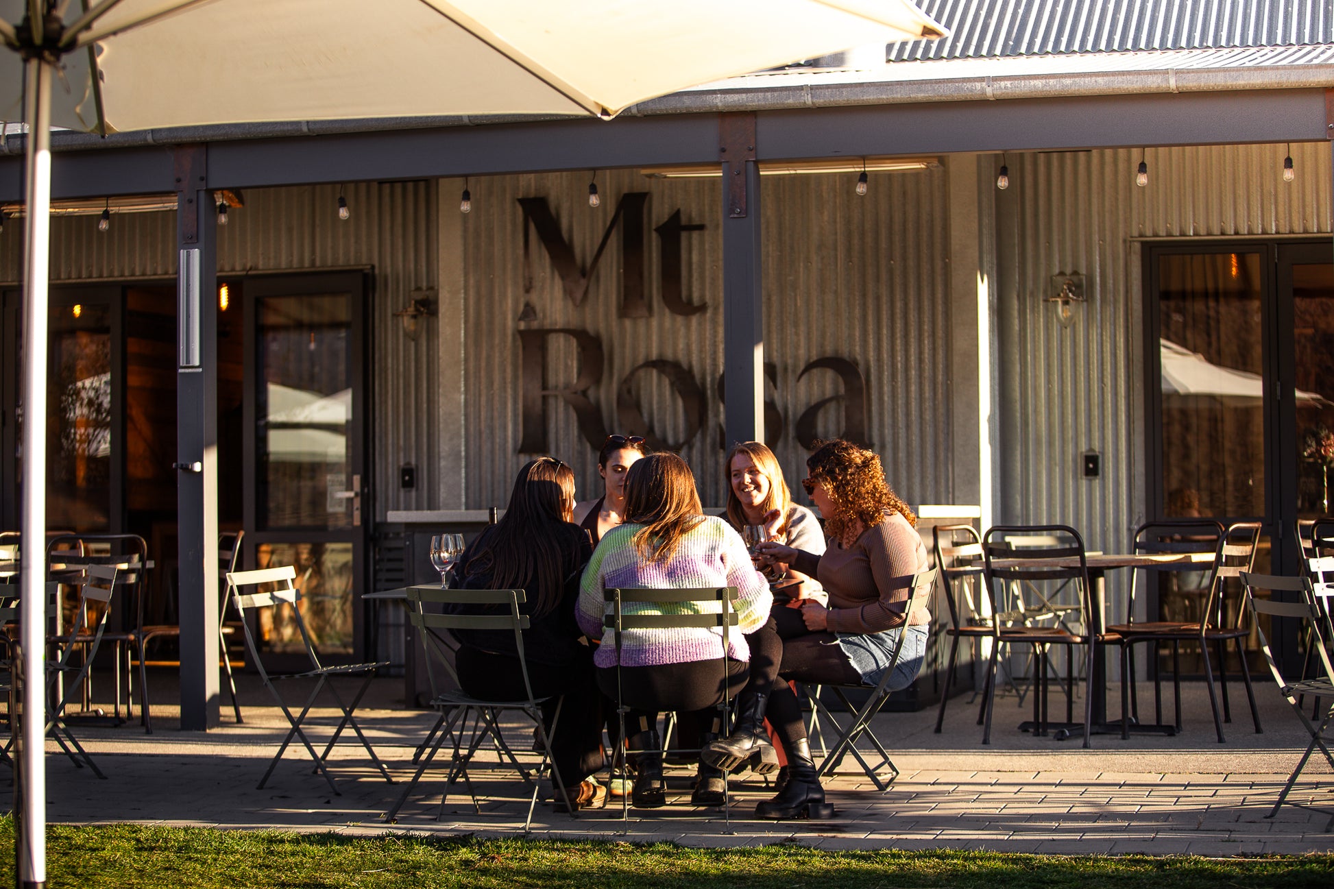 Outdoor winery lunch with shared platters and premium wine tastings in Gibbston Valley