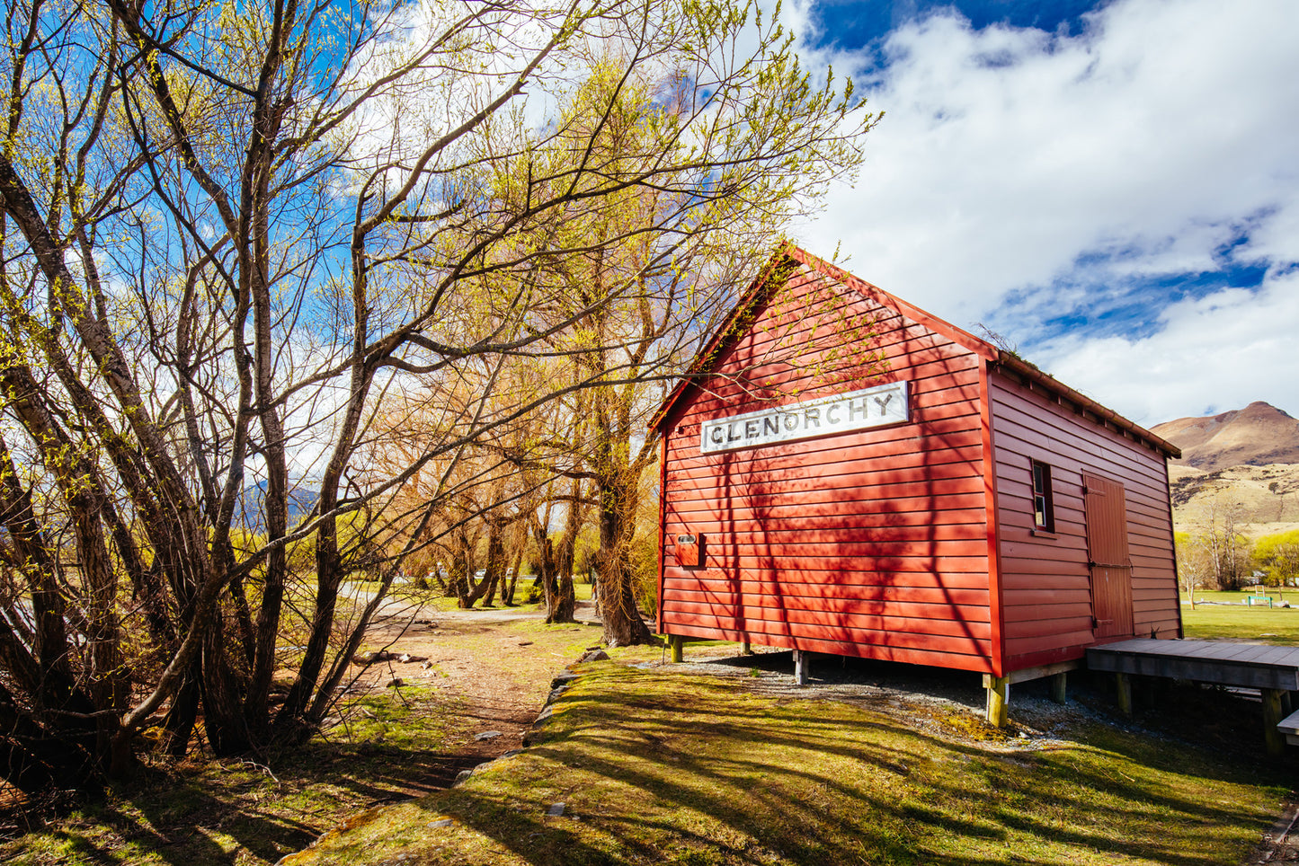 Quaint red shed landmark in Glenorchy township on private Queenstown tour